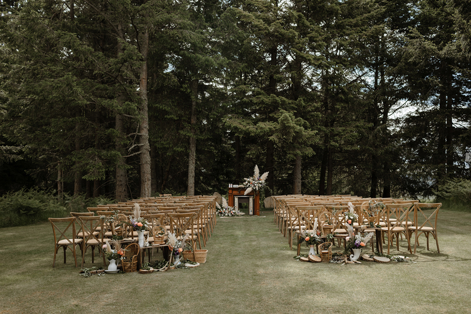 Outdoor ceremony set up with pampas grass on Cardney Estate